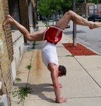 Man Balancing on Hands outside Private Fitness Studio Milwaukee WI